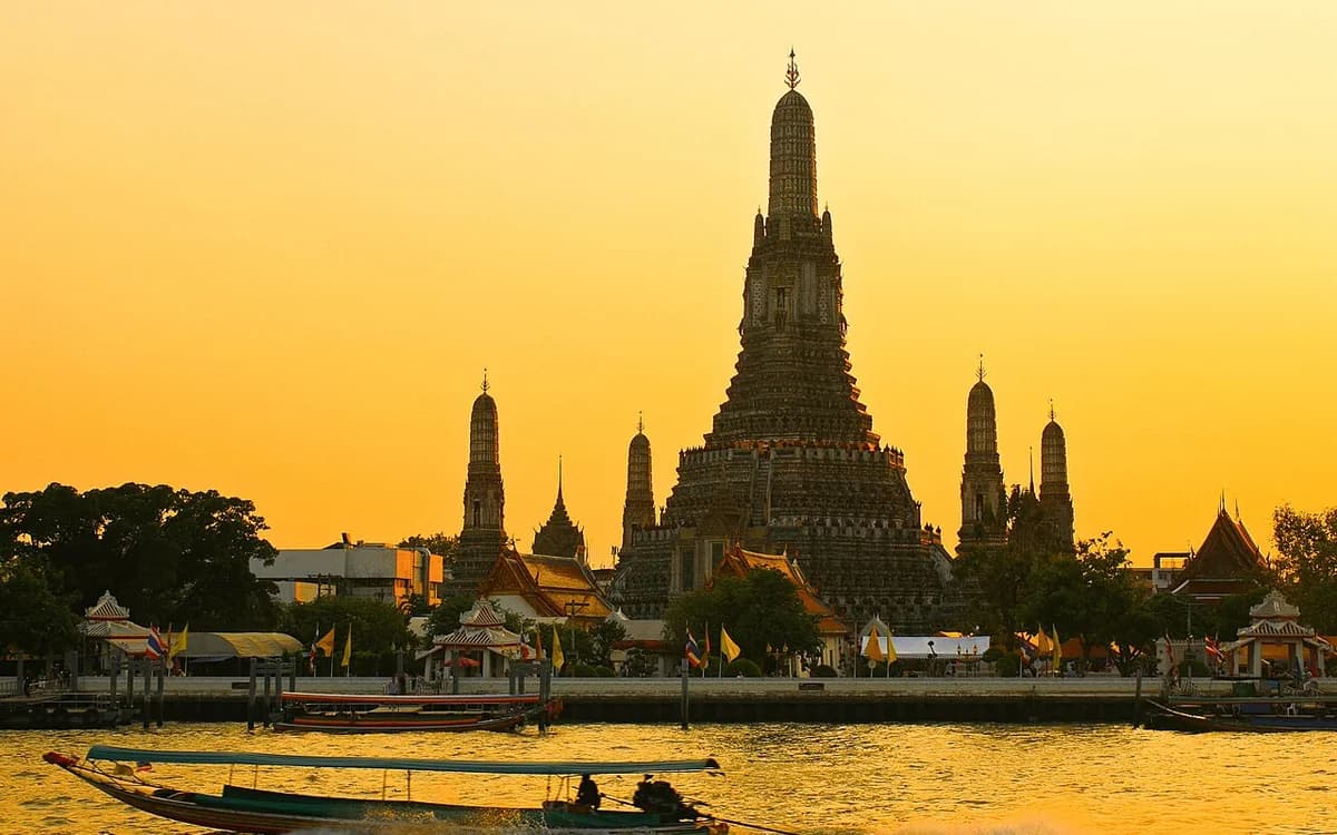 Wat Arun beside the Chao Phraya River in Thailand